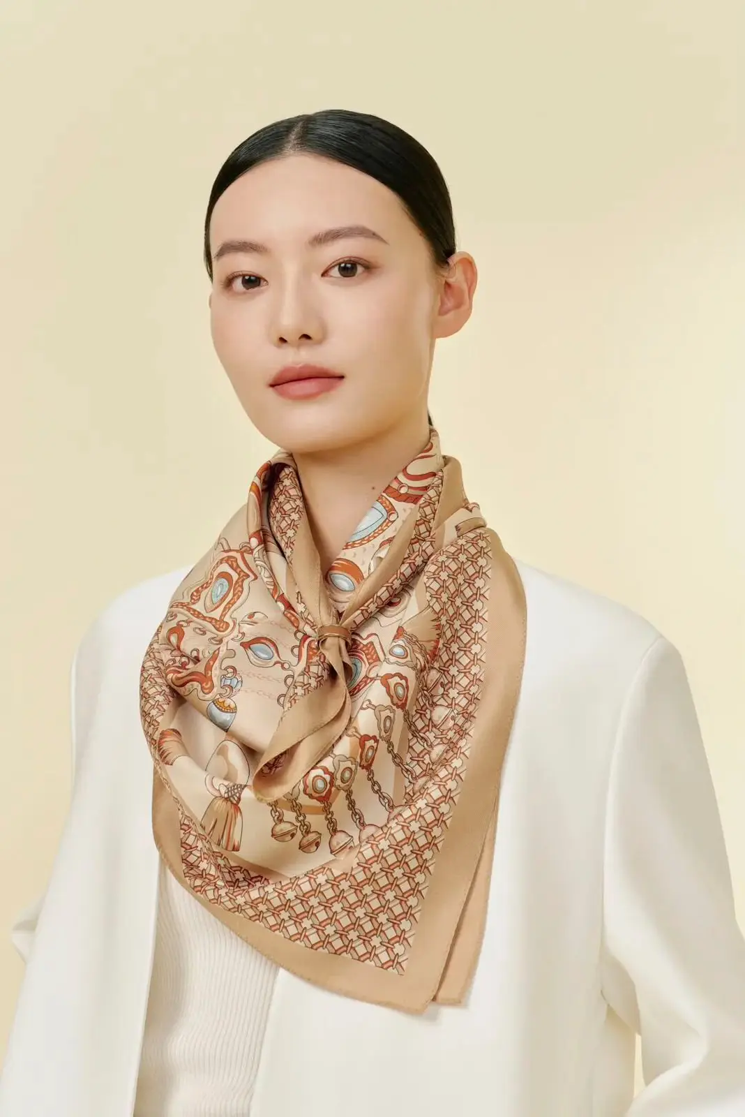 Model wearing the Les Trésors — Sable silk scarf