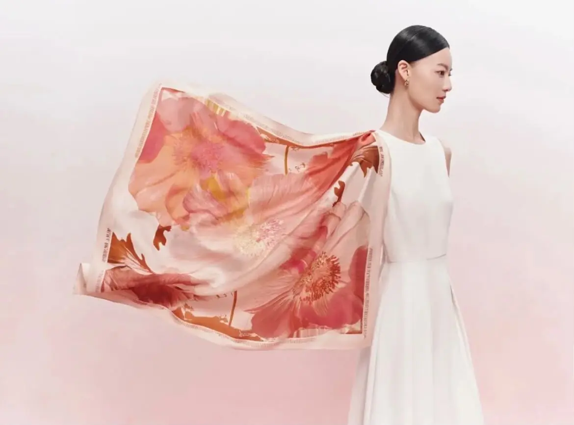 Model wearing the Les Camélias silk scarf